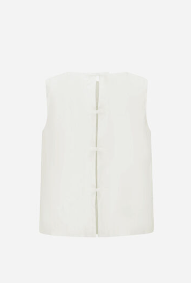 Blusa dettagli fiocchi